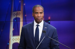 Michigan Secretary of State Jocelyn Benson, a Democrat, and U.S. Rep. John James, a Republican, debate at WOOD TV8's Grand Rapids Tuesday, Oct. 6. (AP Photo/Paul Sancya, Pool)
