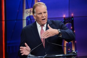 Republican nominee for U.S. Senate Mike Rogers, makes a point during a televised debate with Democratic nominee for U.S. Senate Abdul El-Sayed, at WOOD-TV, on Thursday, Oct. 8, 2026, in Grand Rapids, Mich. (AP Photo/Paul Sancya, Pool)
